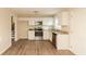 L-shaped kitchen with stainless steel appliances and granite countertops at 2249 Clanton Ter, Decatur, GA 30034
