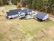 Aerial view of house, detached garage, and expansive backyard at 5601 Atlanta Hwy, Rutledge, GA 30663