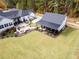 Aerial view showing home's backyard, patio, and detached garage at 5601 Atlanta Hwy, Rutledge, GA 30663