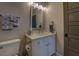 Modern bathroom with a single vanity and updated fixtures at 5601 Atlanta Hwy, Rutledge, GA 30663
