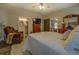 Main bedroom with a king-size bed and ensuite bathroom at 5601 Atlanta Hwy, Rutledge, GA 30663