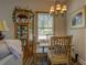 Charming dining area with a table and chairs near a corner cabinet at 5601 Atlanta Hwy, Rutledge, GA 30663