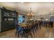 Rustic dining room features a large farmhouse table with black chairs at 5601 Atlanta Hwy, Rutledge, GA 30663