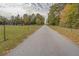 Long paved driveway leading to a house at 5601 Atlanta Hwy, Rutledge, GA 30663