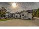 Home's exterior showcasing a patio and pool area at 5601 Atlanta Hwy, Rutledge, GA 30663