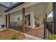 Inviting front porch with rocking chairs and wooden beams at 5601 Atlanta Hwy, Rutledge, GA 30663