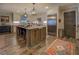 Spacious kitchen with island and stainless steel appliances at 5601 Atlanta Hwy, Rutledge, GA 30663