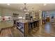 Modern kitchen with a large island and stainless steel appliances at 5601 Atlanta Hwy, Rutledge, GA 30663