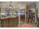 Kitchen boasts an island, stainless steel appliances, and a walk-in pantry at 5601 Atlanta Hwy, Rutledge, GA 30663