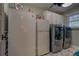 Laundry room with washer, dryer, and extra refrigerator at 5601 Atlanta Hwy, Rutledge, GA 30663