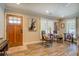 Bright living room with hardwood floors and farmhouse style decor at 5601 Atlanta Hwy, Rutledge, GA 30663