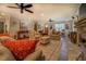 Open living area with stone fireplace and hardwood floors at 5601 Atlanta Hwy, Rutledge, GA 30663