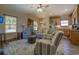 Cozy living room features comfortable seating and an open floor plan at 5601 Atlanta Hwy, Rutledge, GA 30663
