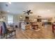 Spacious living room with stone fireplace, hardwood floors, and ample natural light at 5601 Atlanta Hwy, Rutledge, GA 30663