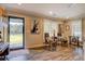 Bright living room with hardwood floors and farmhouse style decor at 5601 Atlanta Hwy, Rutledge, GA 30663