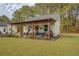 Outdoor kitchen and grilling area with covered patio at 5601 Atlanta Hwy, Rutledge, GA 30663
