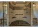 Large walk-in shower with patterned tile details and dual shower heads at 5601 Atlanta Hwy, Rutledge, GA 30663