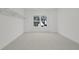 Large walk-in closet with double hanging rods and window at 2910 Caney Parc Way, Cumming, GA 30041
