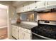 Updated kitchen with granite countertops and stainless steel appliances at 1011 Dunbar Dr, Atlanta, GA 30338