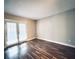 Bright living room with hardwood floors and French doors at 1011 Dunbar Dr, Atlanta, GA 30338