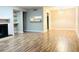 Spacious living room features hardwood floors, fireplace, and built-in shelving at 1011 Dunbar Dr, Atlanta, GA 30338