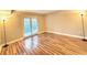 Spacious living room with laminate flooring and french doors at 1011 Dunbar Dr, Atlanta, GA 30338