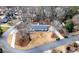 An elevated view displays the home's landscaped yard, circular driveway, and cul-de-sac location at 1412 Dallas Sw Cir, Marietta, GA 30064