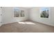 Carpeted bedroom with natural light flooding through the windows, creating a cozy atmosphere at 1412 Dallas Sw Cir, Marietta, GA 30064