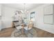 Elegant dining area with modern chandelier and round table at 1412 Dallas Sw Cir, Marietta, GA 30064