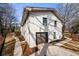 Rear exterior view showing a garage and a deck on a sunny day at 1412 Dallas Sw Cir, Marietta, GA 30064