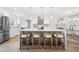 Bright, modern kitchen featuring an island with seating and stainless steel appliances at 1412 Dallas Sw Cir, Marietta, GA 30064