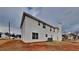 Two-story house with vinyl siding and a backyard at 4668 Snap Creek Ln, Decatur, GA 30035