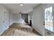 Living room with fireplace, high ceilings and wood-look floors at 4668 Snap Creek Ln, Decatur, GA 30035