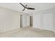 Spacious bedroom with ample closet space and ceiling fan at 4870 Twin Lakes Trl, Atlanta, GA 30360