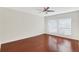 Spacious bedroom with hardwood floors and large windows at 4870 Twin Lakes Trl, Atlanta, GA 30360