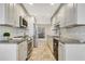 Renovated kitchen, granite countertops, stainless steel appliances at 4870 Twin Lakes Trl, Atlanta, GA 30360