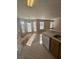 Kitchen with vinyl flooring and access to dining area at 136 Fox Creek Dr # 136, Woodstock, GA 30188