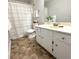 Cozy bathroom featuring a shower/tub combo, white vanity, and neutral tones at 1507 Wynnes Ridge Se Cir, Marietta, GA 30067