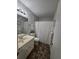 Clean bathroom with vanity and shower-tub combination at 1507 Wynnes Ridge Se Cir, Marietta, GA 30067
