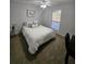 Bedroom featuring a double bed, ceiling fan, and natural light at 1507 Wynnes Ridge Se Cir, Marietta, GA 30067