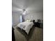 Comfortable bedroom with a ceiling fan, window, and a dresser at 1507 Wynnes Ridge Se Cir, Marietta, GA 30067