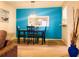 Bright dining area with a blue accent wall at 1507 Wynnes Ridge Se Cir, Marietta, GA 30067