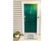 Inviting green front door with decorative wreath and 'Home Sweet Home' welcome mat at 1507 Wynnes Ridge Se Cir, Marietta, GA 30067