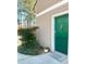 Inviting green front door with decorative wreath and 'Home Sweet Home' welcome mat at 1507 Wynnes Ridge Se Cir, Marietta, GA 30067