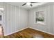 Bedroom with hardwood floors and view of backyard at 1709 Valencia Rd, Decatur, GA 30032