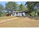 Newly renovated ranch home with carport and a large backyard at 1709 Valencia Rd, Decatur, GA 30032