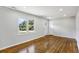 Living room with hardwood floors and neutral color palette at 1709 Valencia Rd, Decatur, GA 30032