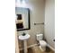 Pedestal sink and tile floor in the bathroom at 1963 White Top Rd. Se, Lawrenceville, GA 30045