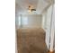 Spacious bedroom featuring a ceiling fan and bright windows at 1963 White Top Rd., Lawrenceville, GA 30045