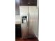 Side-by-side stainless steel refrigerator in the kitchen at 1963 White Top Rd. Se, Lawrenceville, GA 30045